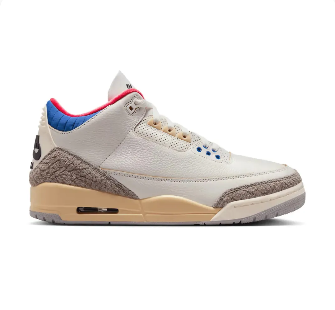 Cream Sneakers with Elephant-Print Overlays & Blue and Red Accents