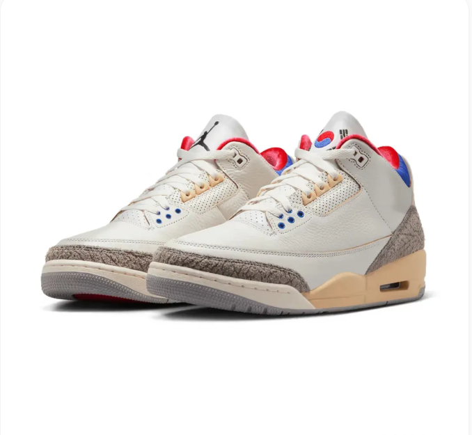 Cream Sneakers with Elephant-Print Overlays & Blue and Red Accents