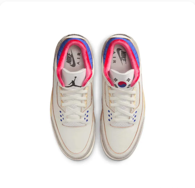Cream Sneakers with Elephant-Print Overlays & Blue and Red Accents