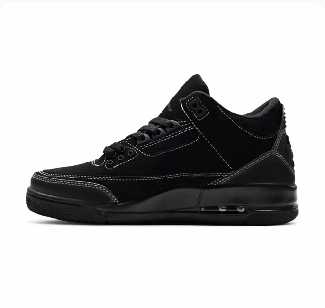 All-Black Sneakers with White Contrast Stitching