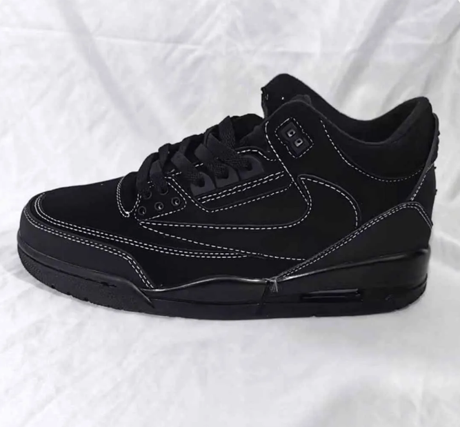 All-Black Sneakers with White Contrast Stitching