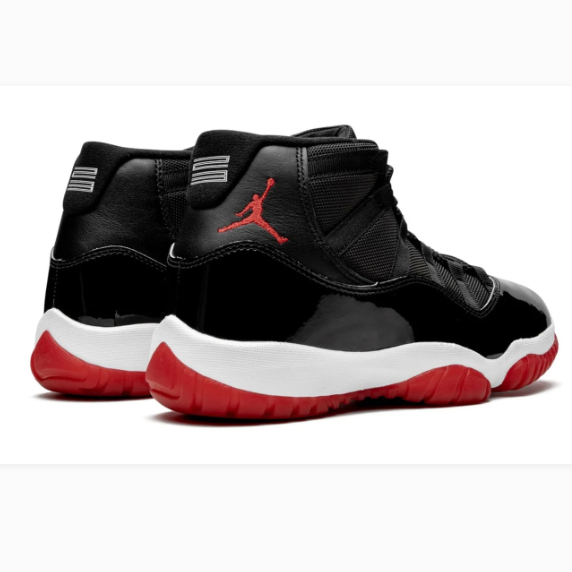 Black High-Top Sneakers with Glossy Overlays & Red Soles